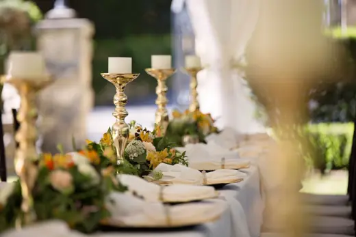Candlelit floral wedding table detail
