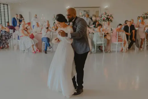 Newlyweds dancing at their wedding reception