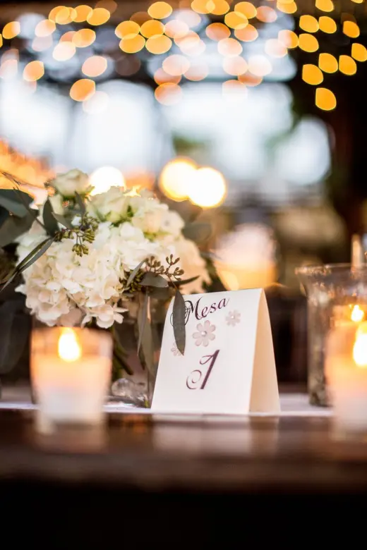 Candlelit wedding table and place card