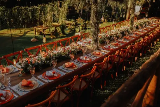 Long wedding dinner table in a garden