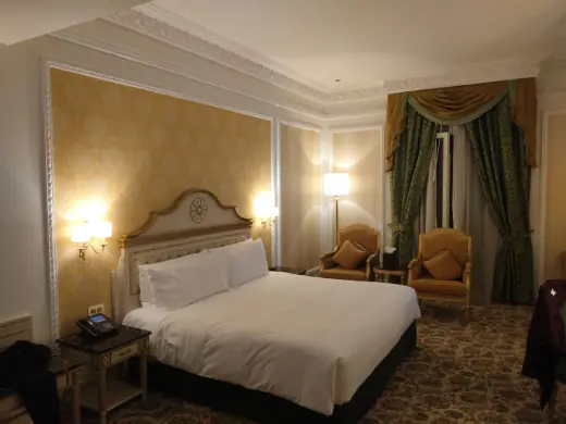 Elegant guest suite with a bed and classic furnishings