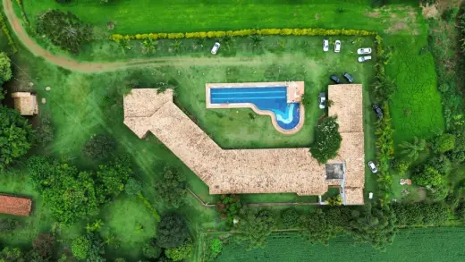 Aerial view of countryside estate and pool