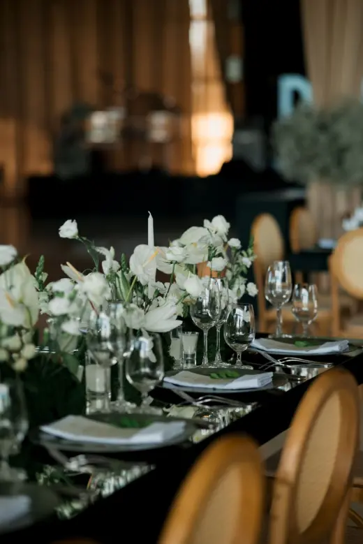 Elegant reception table with floral centerpiece