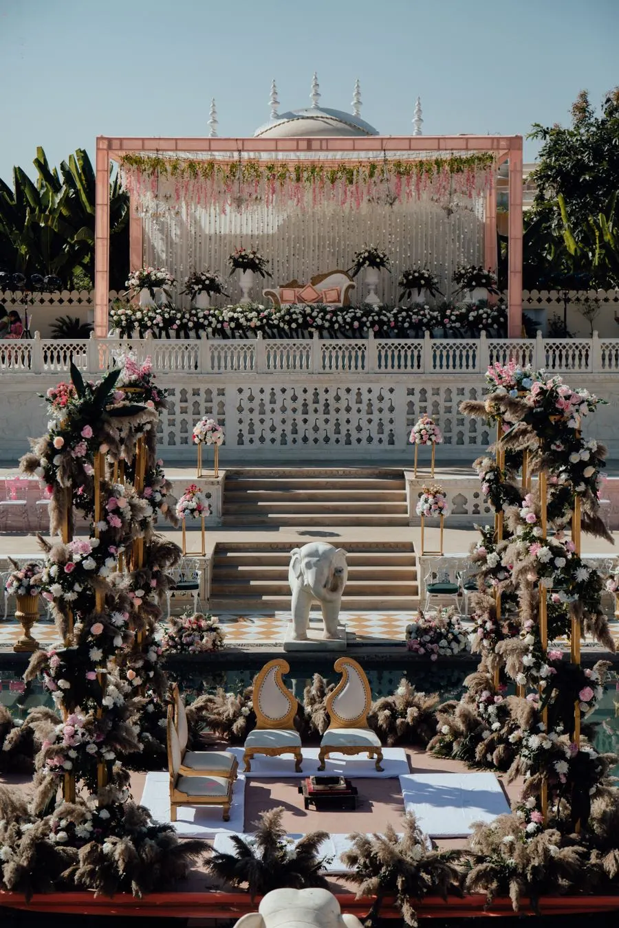 Outdoor wedding ceremony at a waterside property